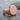 Weathered Signet Ring, rose gold, angled product photo on stone