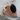 Black Onyx Zihgir Ring, rose gold, product photo on stone