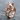Playful Cat Ring, rose plated silver, angled product photo on stone
