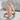 Dual Angel Wings Ring, rose gold, product photo on stone