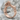Lesbian Couple Ring, rose gold, angled product photo on stone