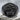 Bonsai Tree Ring, black rhodium, front view on stone surface