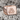 Double Triangle Pride Ring, rose gold, front view on textured stone