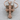 Gothic Lily Cross Pendant, rose gold, product photo angled on wood block