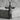 Holy Trinity Crucifix Pendant, black rhodium, front view on stone