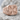 Iron Cross Ring, rose plated silver, angled view on stone