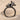 Two Giraffes Ring, black rhodium, front view on sand