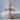 Rose Vine Cross Pendant, rose gold, front view on stone