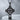 Knotwork Celtic Cross Pendant, black rhodium finish, front view on stone block