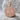 Saint Benedict Medal Pendant, rose gold, front view on stone