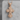 Orthodox Archangel Cross Pendant, rose gold, front view on stone block