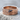 Raw texture band ring, rose gold finish, product view on stone