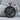 Jesus Carrying Cross Pendant, black rhodium, product photo on stone