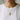 Gold plated hummingbird turquoise necklace worn around neck showcasing chain length and pendant size on model