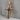 Black Stone Cross Pendant, rose gold, angled product photo on stone stand