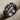 Curb Chain Ring, black rhodium, product photo on fabric