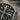 Baroque Maltese Cross Ring, oxidized silver, close-up of carved relief details