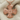 Beaded Celtic Cross Pendant, rose gold, front view on fabric