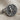 Saint George Dragon Ring, oxidized silver, angled tabletop view
