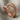 Shark Jaw Teeth Ring, rose gold, angled view on fabric