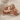 Dueling Lions Ring, rose gold, product photo on fabric