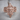 Royal Cross Ring, rose gold, front view on wood surface