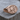 Flavia Felix Lion Ring, rose gold, angled product view on wood