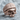 Knit Beanie Skull Ring, rose gold, product photo on stone surface