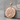 Wolf and Fox Pendant, rose gold, product photo on stone display