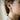Luwian Life Hieroglyph Earring, two-tone finish, worn on model ear