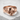 Low Profile Skull Band Ring, rose gold, front product view on concrete