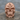 Sunburst Masonic Skull Ring, rose gold, product photo on stone