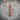 Lattice Skull Bullet Pendant, rose gold, product photo on stone