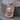 Bear Dog Tag Pendant in rose gold, angled front view on wood