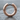 Chiseled Distressed Hoop Earring, rose gold, front view on stone