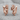 Angel Devil Earring, rose gold, front product view on stone surface