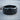 Spiral Wave Ring, black rhodium, angled view on wood slice
