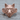 Lone Wolf Ring, rose gold, front view on wood surface