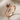 Garnet Nail Ring, rose gold, angled product photo on fabric