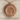 Ouroboros Tree Pendant, rose gold, front product view on stone