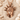 Statue of Liberty Pendant, rose gold, front view on sand
