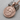 Zeus God of Thunder Pendant, rose gold, product photo on stone surface