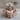 Front double bicep bodybuilder pendant, rose gold, front view on wood block