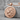 Lion Profile Pendant, rose gold, product photo on stone display