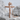Bound Crucifix Pendant, rose gold, product photo on stone