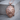 Snarling Lion Head Pendant, rose gold, product photo on wood block