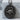 Genbu Guardian Medallion Pendant, polished silver, front view on concrete stand
