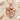 Mother Baby Sun Pendant, rose gold finish, front view on sand