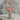 Saint Benedict Crucifix Pendant, polished, product photo on stone base