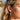 Rose Cross Earring, gold vermeil, worn on model ear